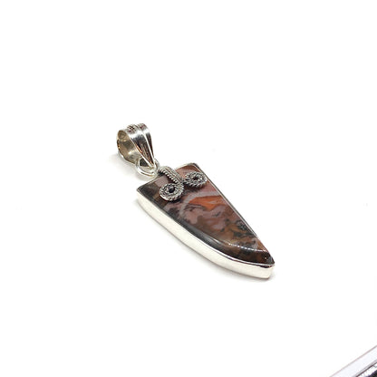 Mens tooth shaped pendant