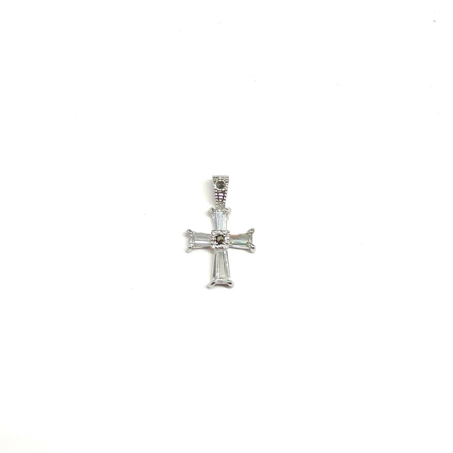 Silver cross pendant on a white background