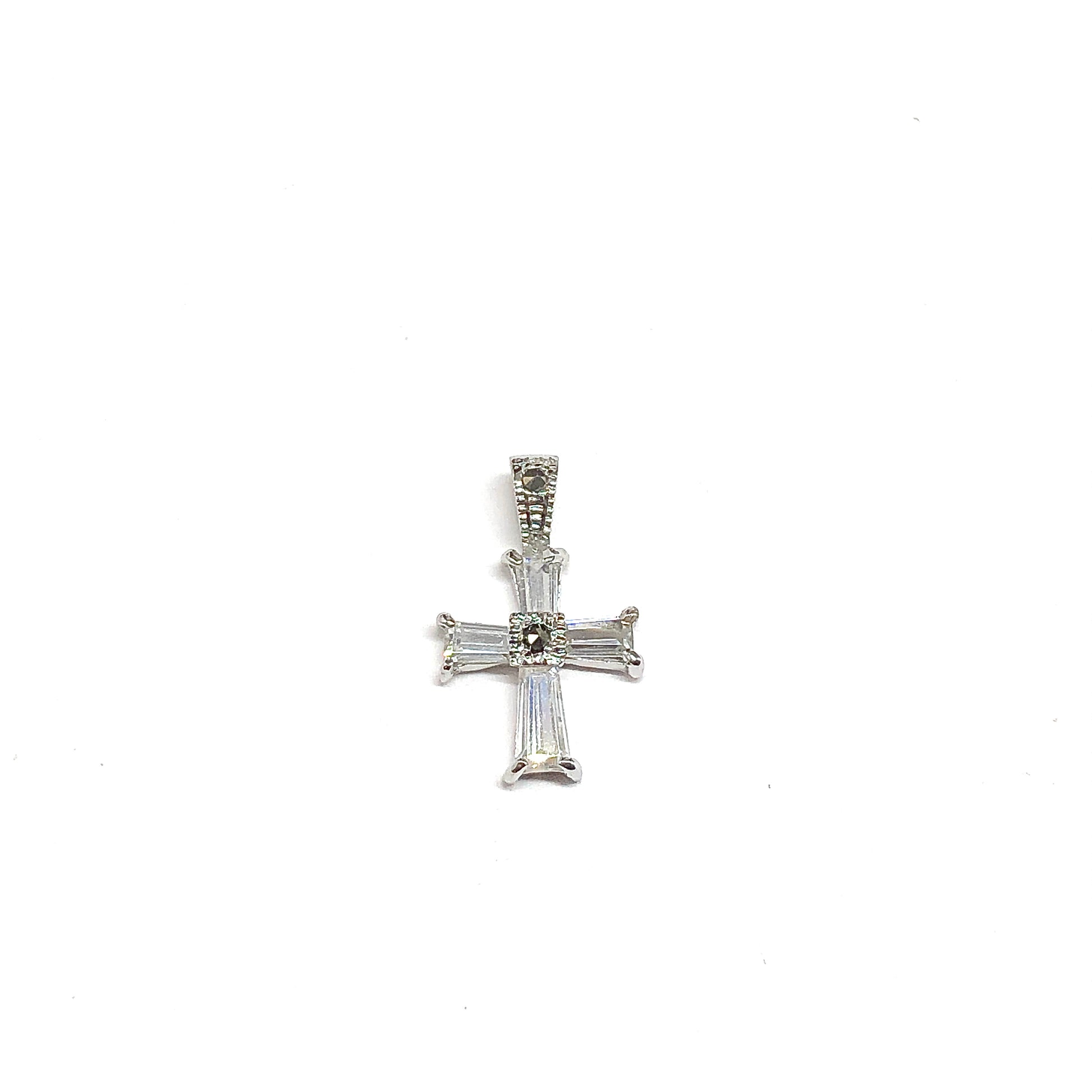 925 Silver cross pendant with clear gemstones on a white background