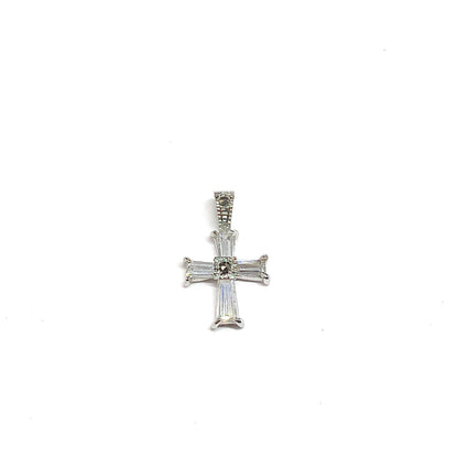 925 Silver cross pendant with clear gemstones on a white background