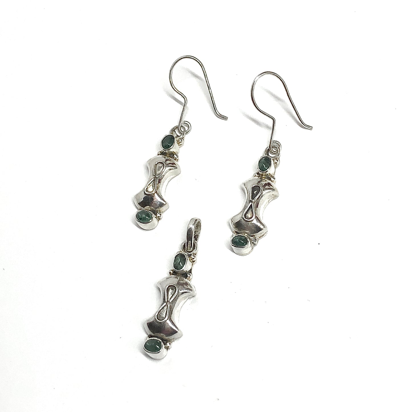 Pair of silver earrings with green emerald gemstones plus matching necklace pendant