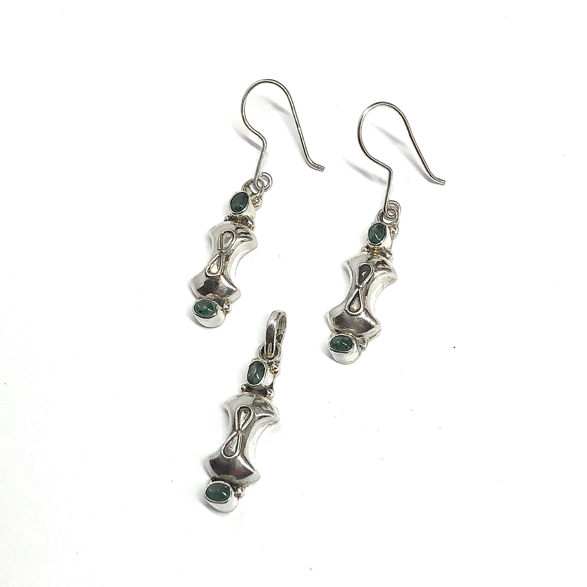 Pair of silver earrings with green emerald gemstones plus matching necklace pendant