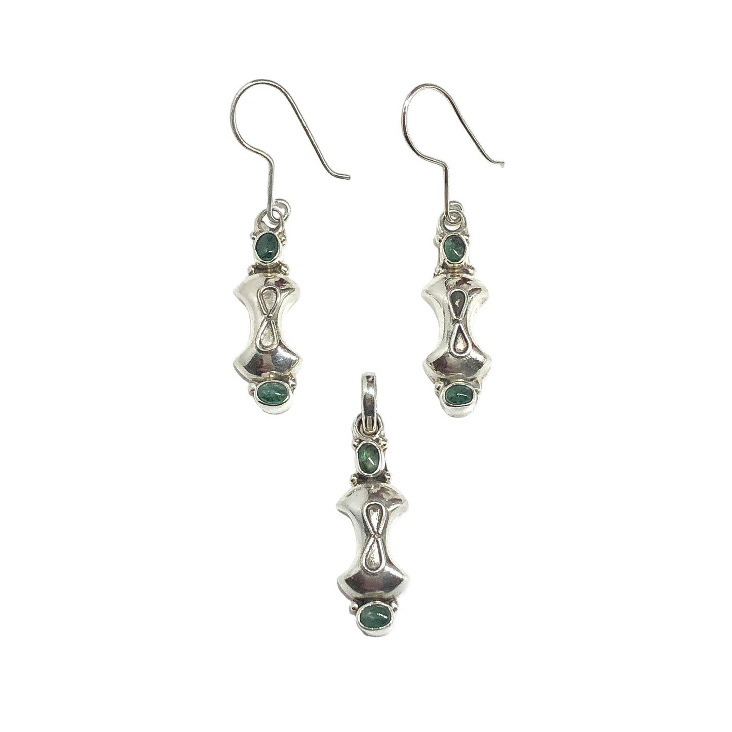 Silver earrings and pendant with green gemstones on a white background