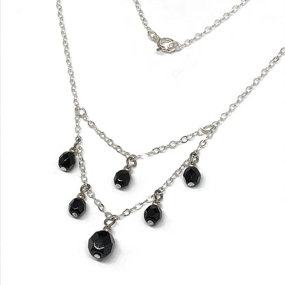 Double-layered necklace with black crystal beads