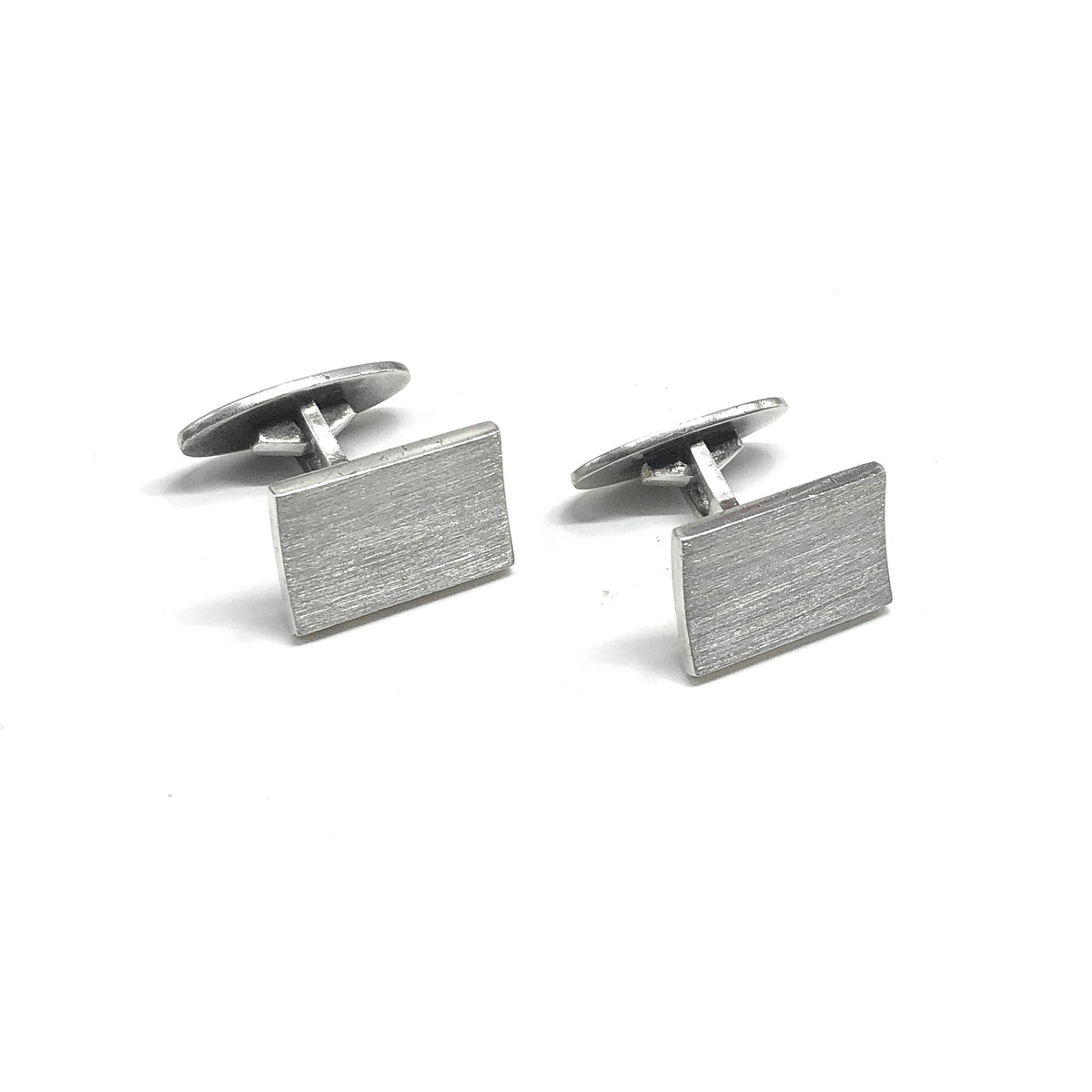 A pair of 925 silver rectangular cufflinks with a brushed metal texture, Vintage Jewelry Online.