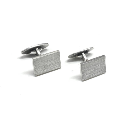 A pair of 925 silver rectangular cufflinks with a brushed metal texture, Vintage Jewelry Online.