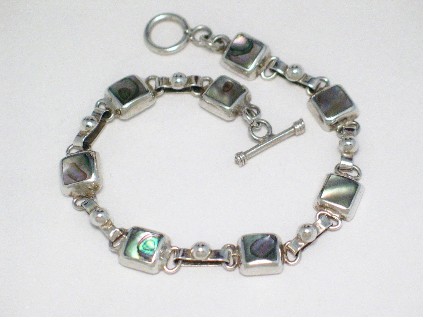 Secondhand Bracelets | Sterling Silver Rainbow Abalone Tennis Bracelet 7.5" - Blingschlingers Jewelry