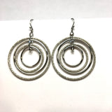 Orbiting Hoops | Sandblasted Multi Circle Silver Dangle Earrings | Costume Jewelry - Blingschlingers Jewelry