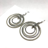 Orbiting Hoops | Sandblasted Multi Circle Silver Dangle Earrings | Costume Jewelry - Blingschlingers Jewelry
