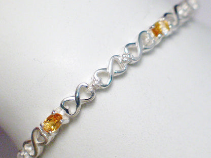 Bracelet | Sterling Silver Citrine Heart Link Tennis Bracelet  8 1/8" | Womens Jewelry online at www.Blingschlingers.com