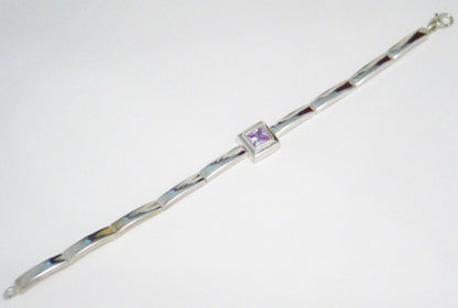 Sterling Silver Bracelet, 7.5" Pre-owned Purple CZ Single Square Stone Tennis Bracelet - Blingschlingers Jewelry