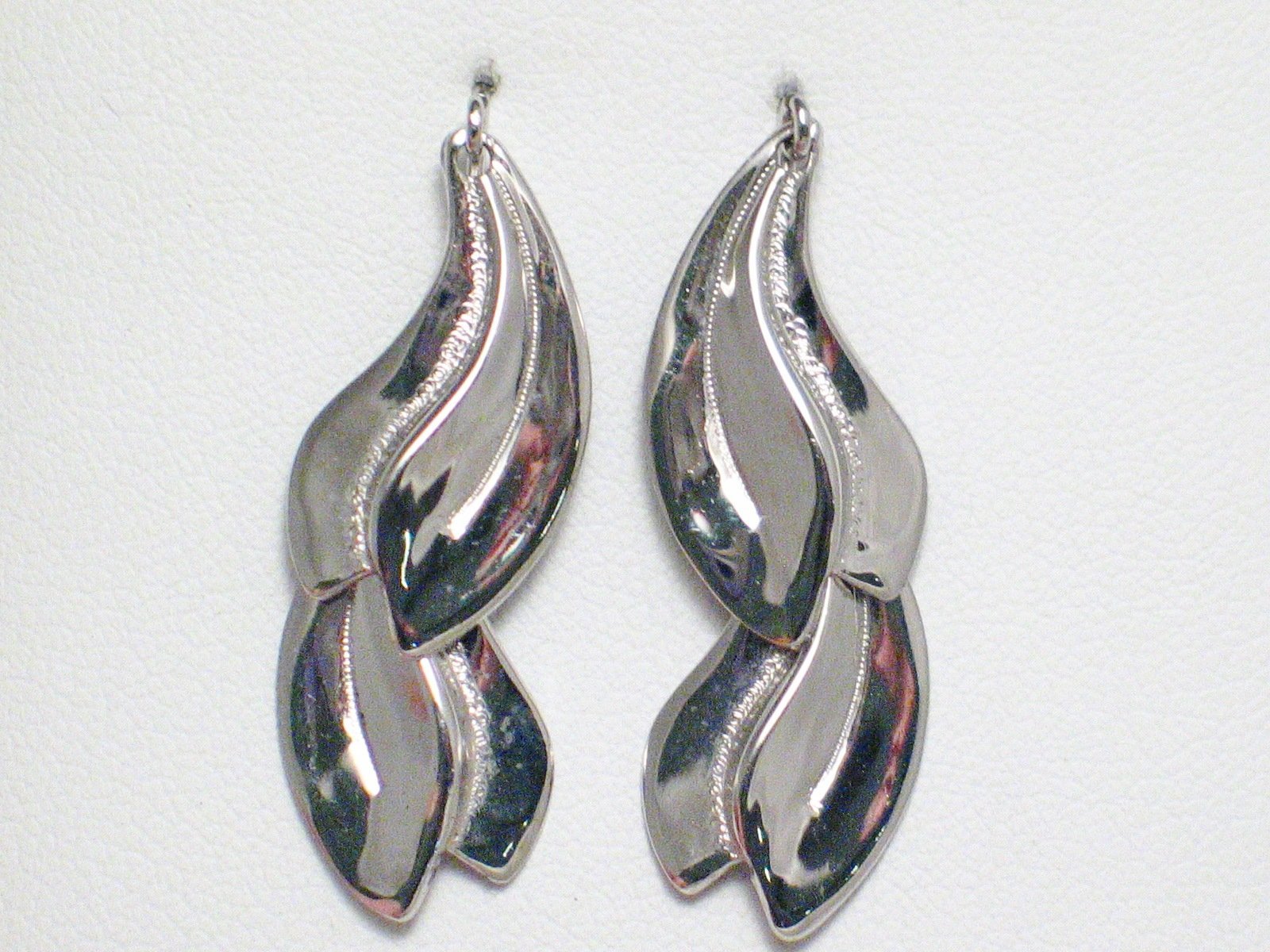 Silver Earrings | Womens Sterling Flirty Wavy Feather Design Dangle Earrings | Estate Jewelry Website at  Blingschlingers.com