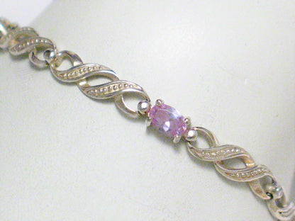 Infinity | Sterling Silver Tennis Bracelet w/ Lilac Cz 7" - Blingschlingers Jewelry