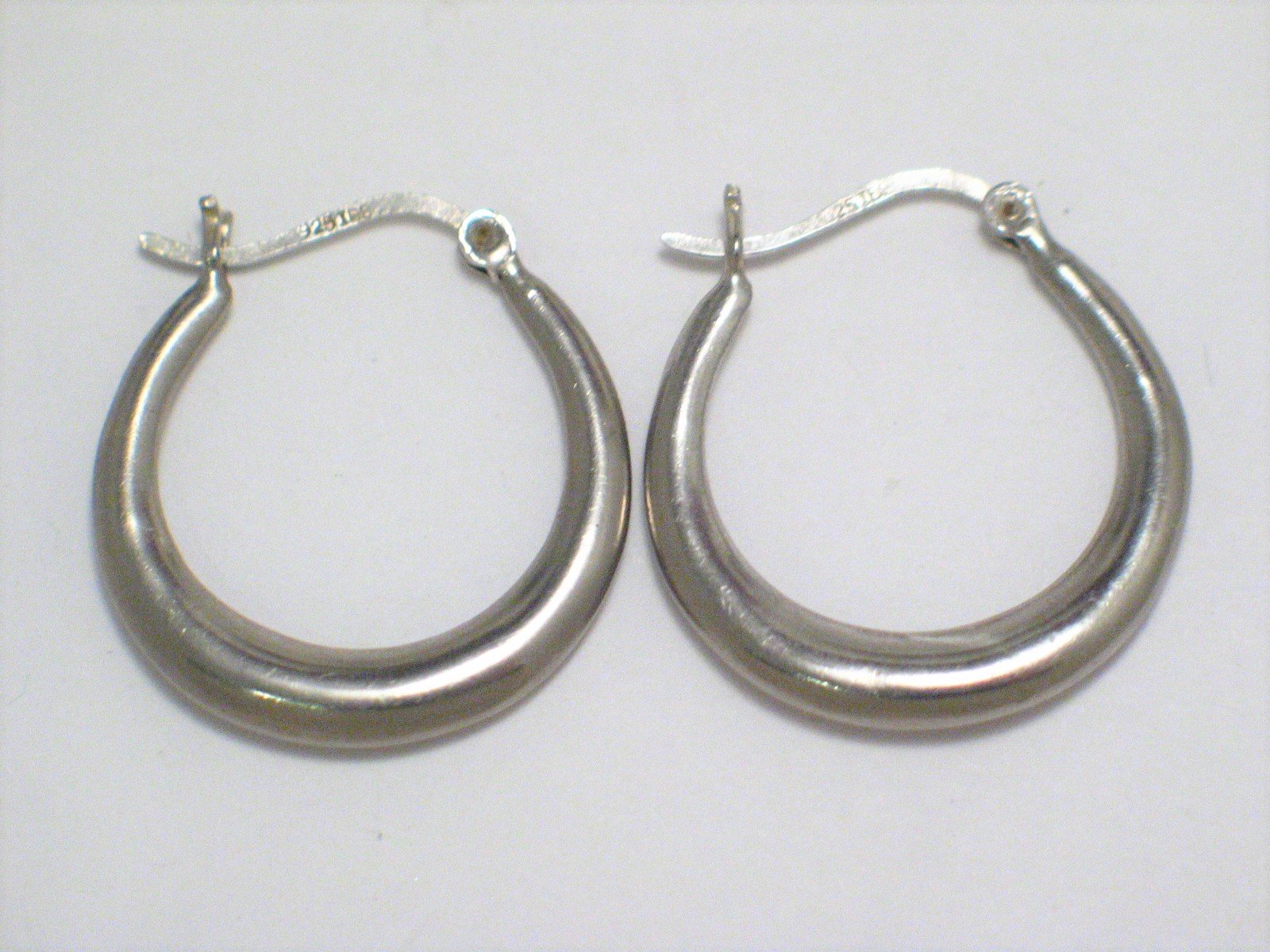 Hoop Earrings | Pre-Owned Fashionable Sterling Silver Horseshoe Style Hoop Earrings