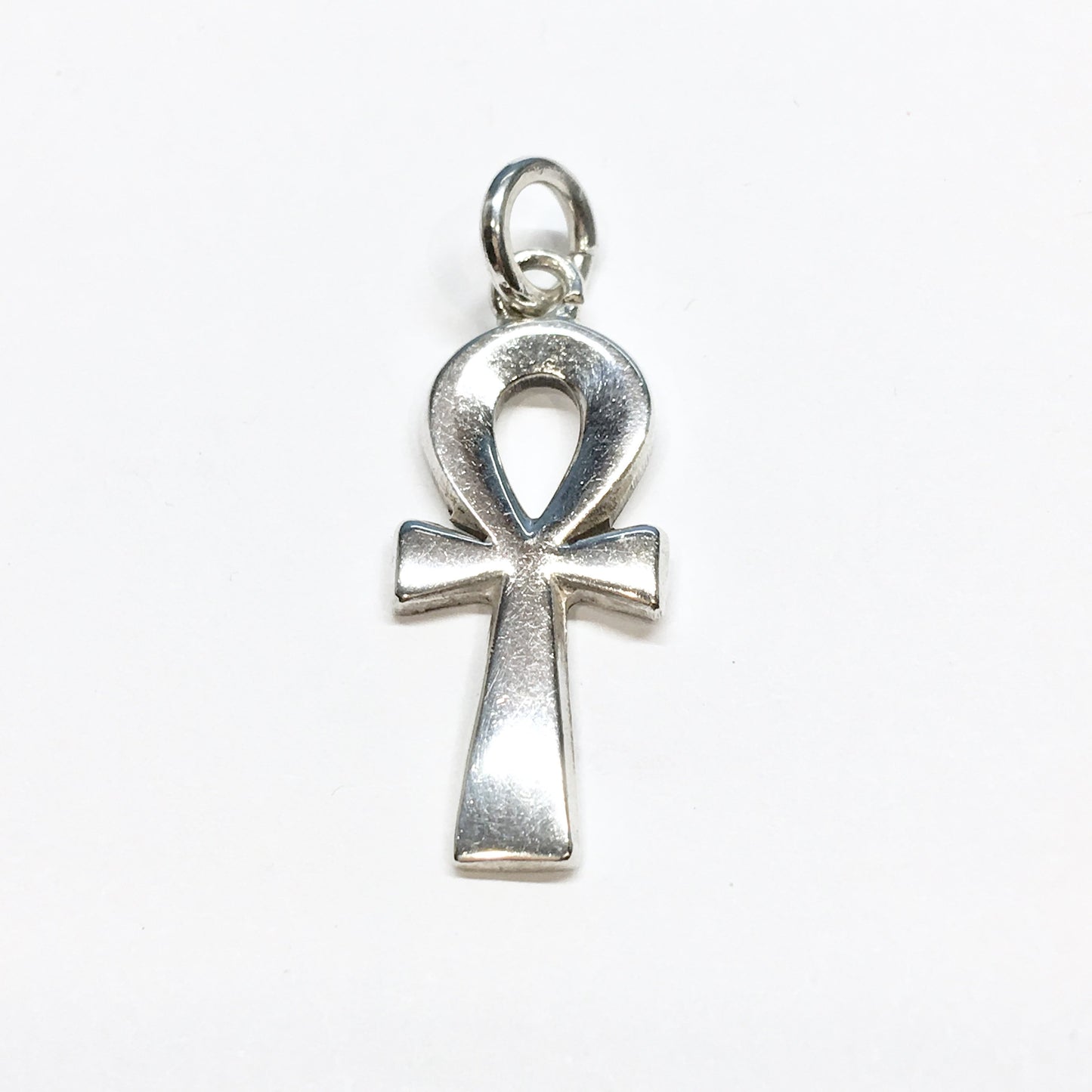 https://www.blingschlingers.com/products/egyptian-life-sterling-silver-ankh-cross-pendant-mens-womens