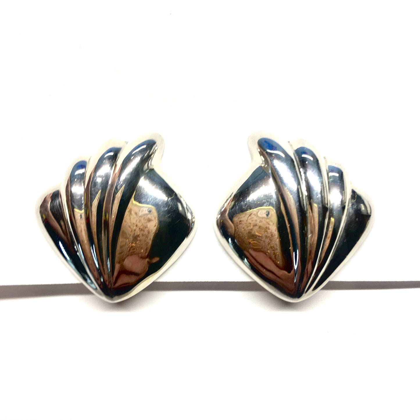 Used Jewelry > Earrings | Womens Sterling Silver A Symmetrical Scalloped Design Clip-On Earrings - Blingschlingers Jewelry