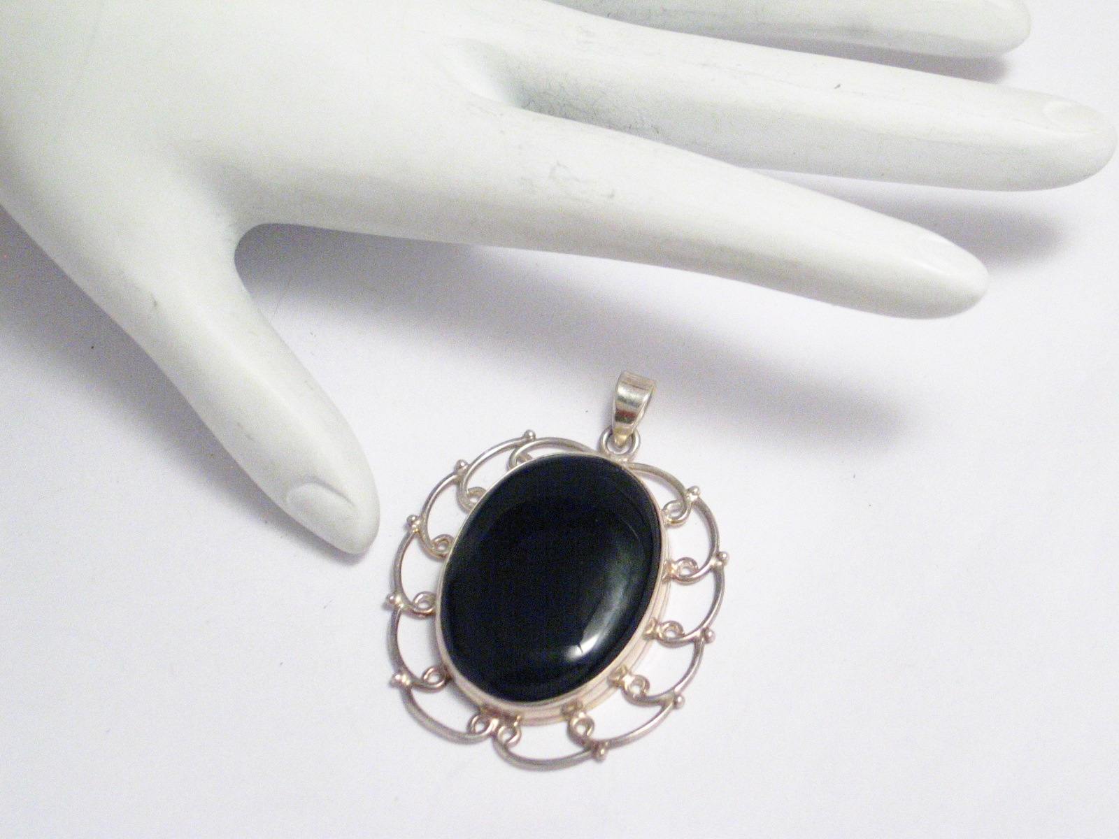 Silver Pendants | Large Bold Oval Sterling Silver Looped Design Black Stone Pendant | Discount Jewelry at Blingschlingers Jewelry