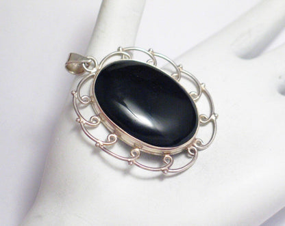 Silver Pendants | Large Bold Oval Sterling Silver Looped Design Black Stone Pendant | Discount Jewelry online at  Blingschlingers Jewelry